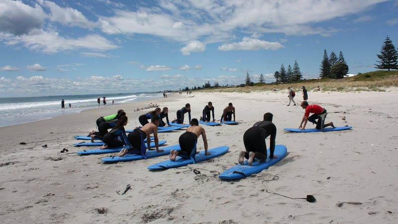 Experience the thrill of riding a wave at one of New Zealand's most iconic beaches with a 2hr surf lesson brought to you by the O'Neill Surf Academy!